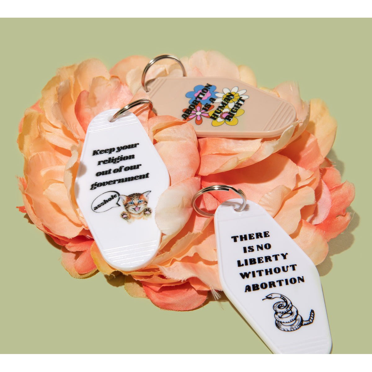 Abortion is a Human Right Keychain in Groovy '70s Flower Print