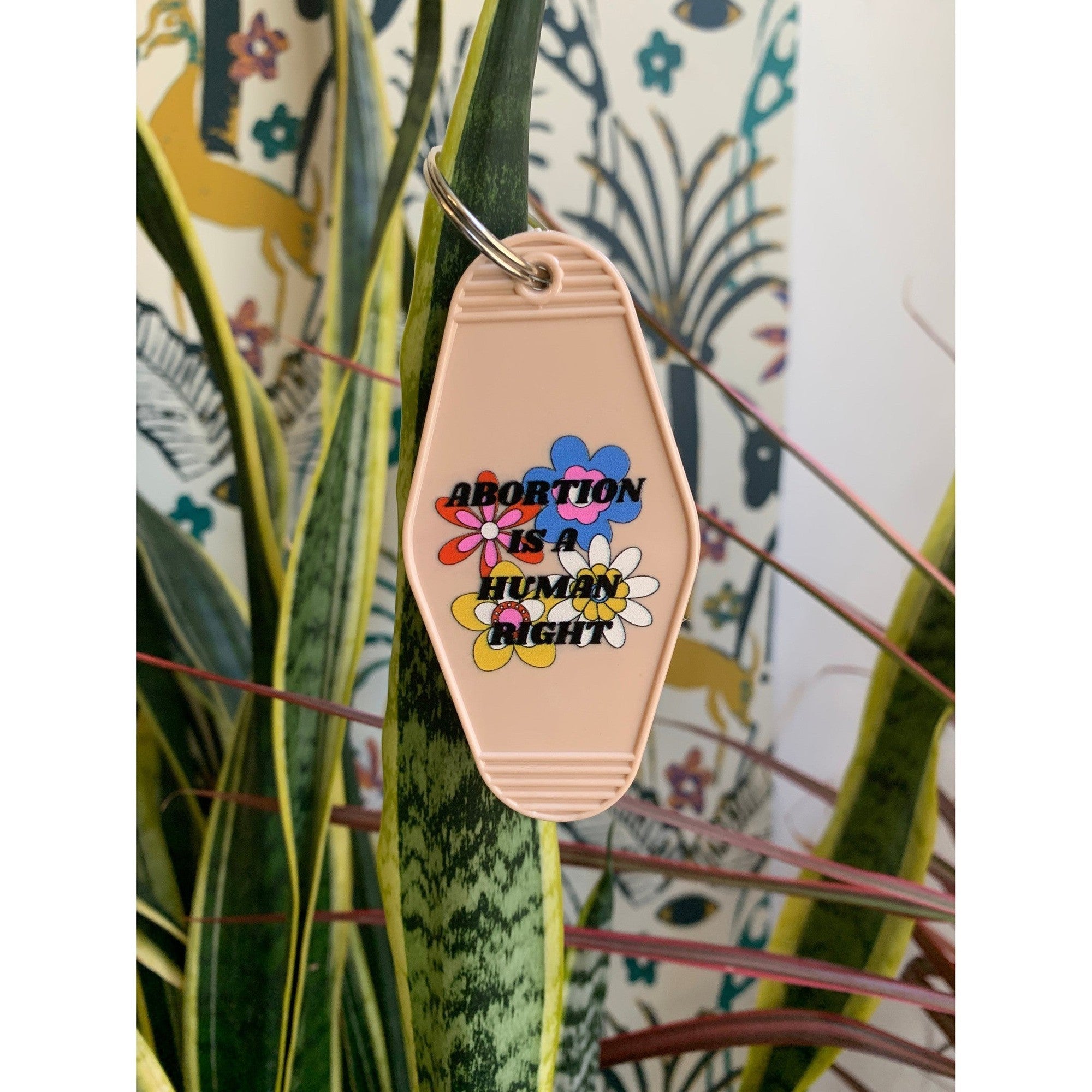 Abortion is a Human Right Keychain in Groovy '70s Flower Print