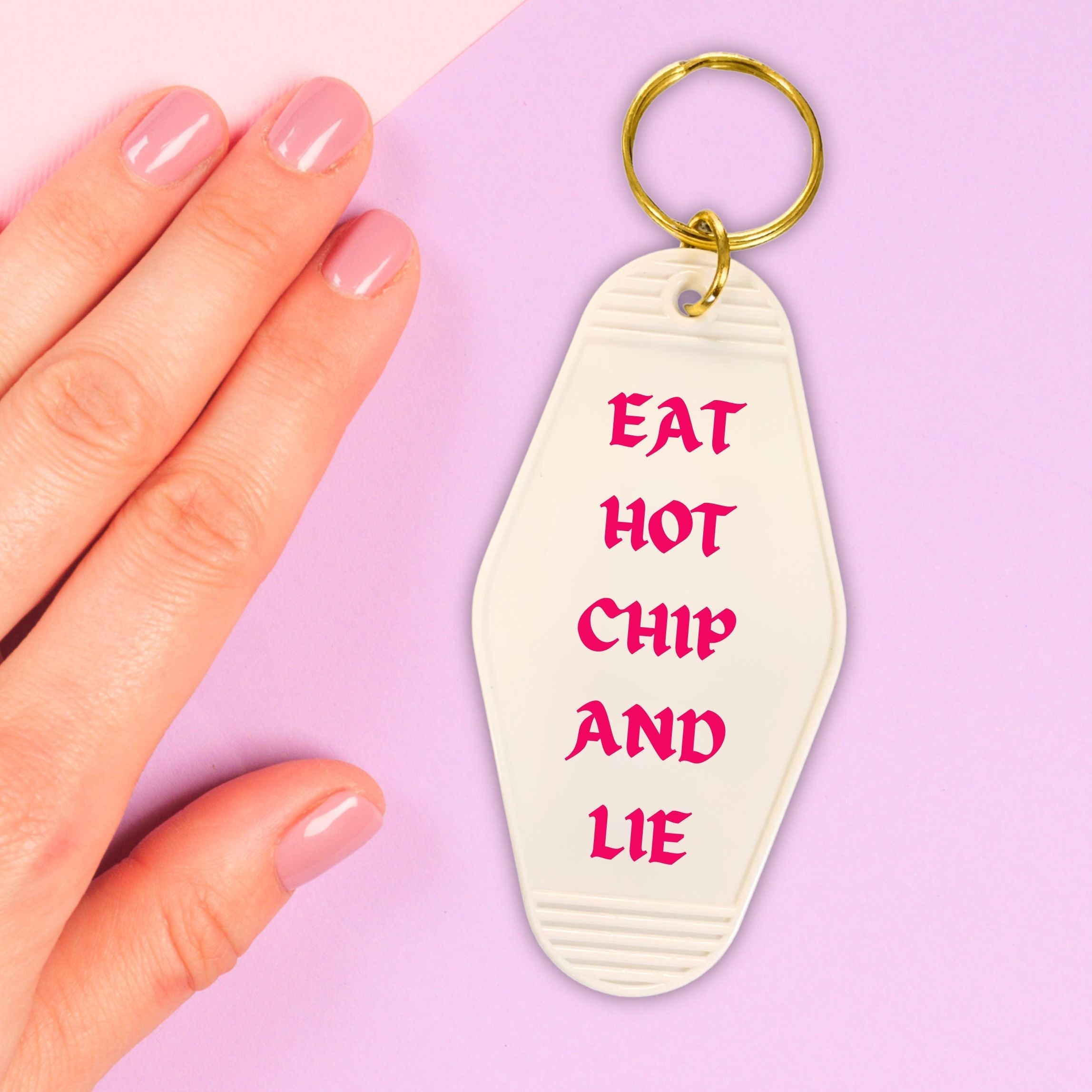 Eat Hot Chip and Lie Motel Style Keychain in White