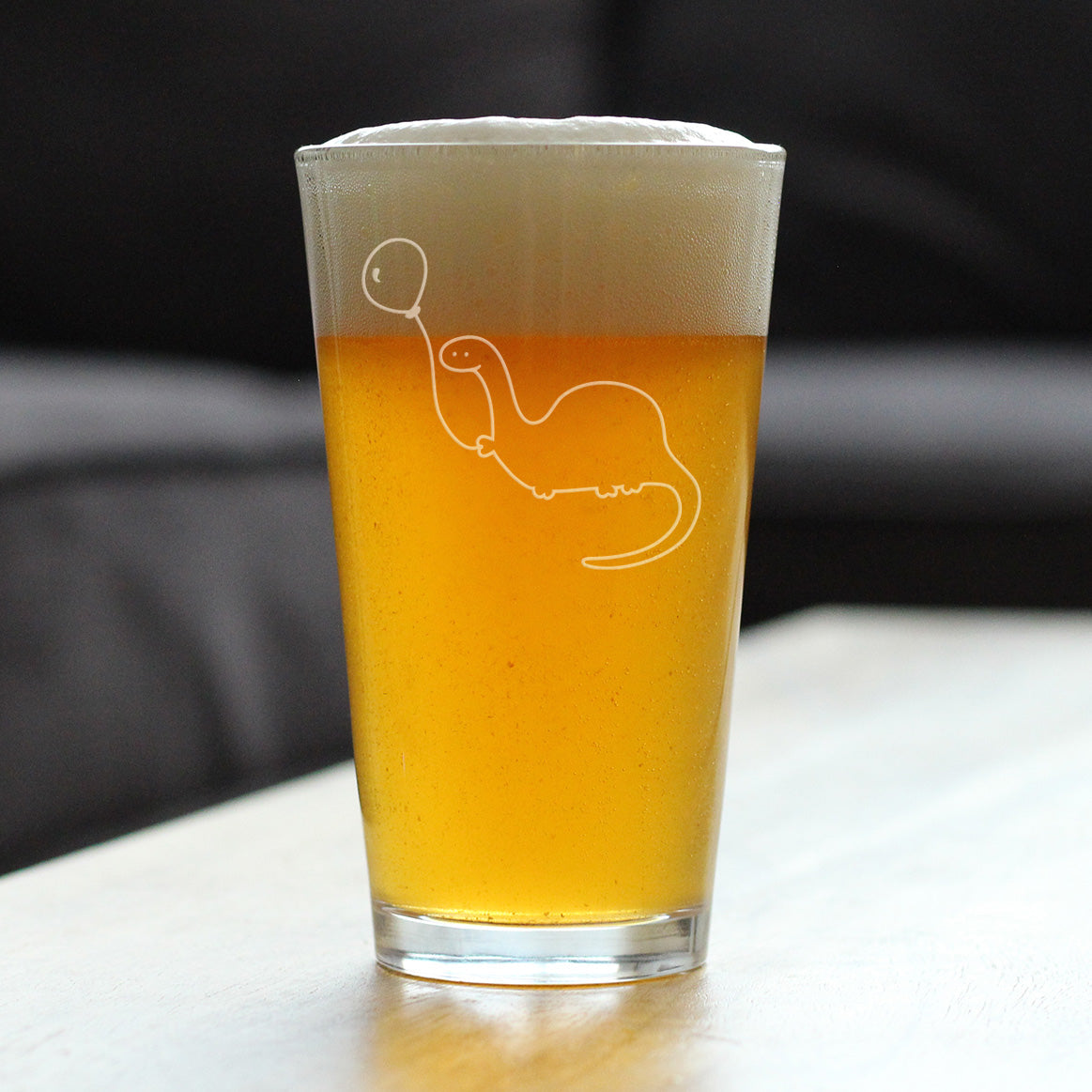 Dinosaur With Birthday Balloon - Pint Glass for Beer - Cute Funny Dino Themed Gifts and Decor for Dinosaur Lovers - 16 oz Glass