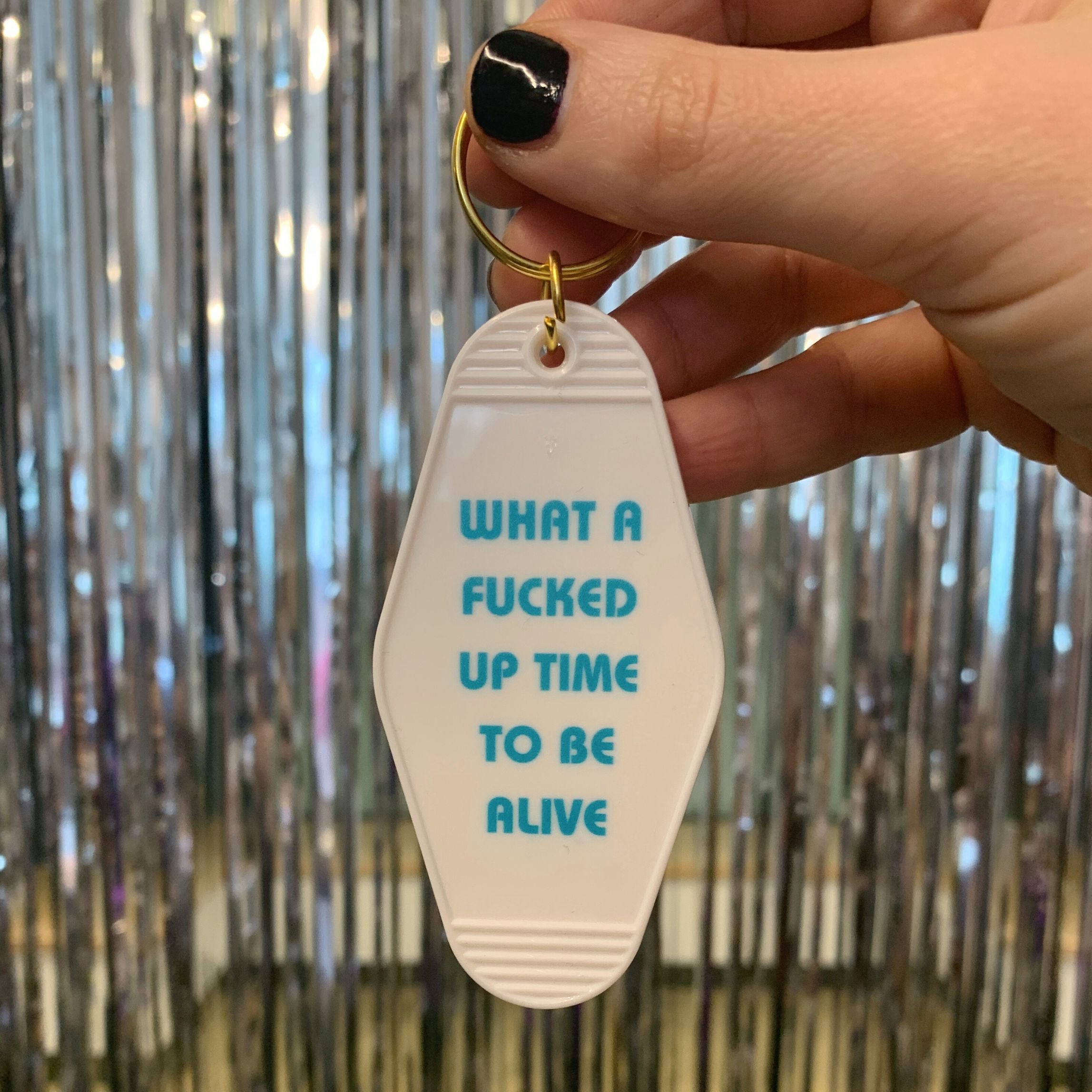 What a Fucked Up Time to Be Alive Motel Style Keychain in White